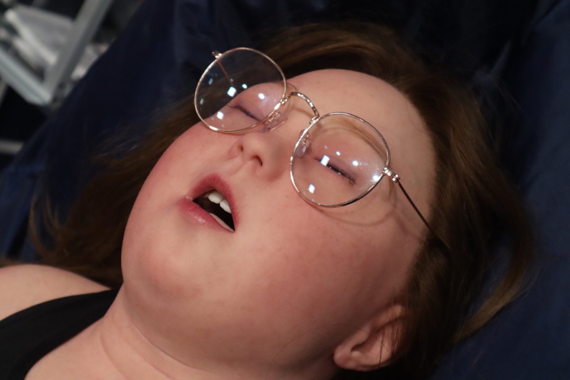 Gwen, a manikin who has Down Syndrome